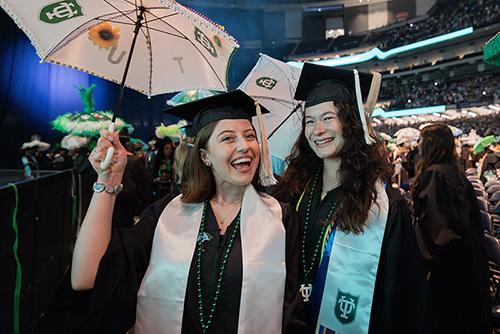 Tulane students smile at the commencement ceremony